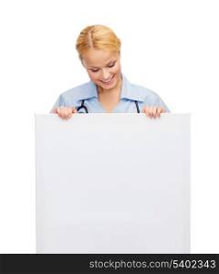 healthcare, medicine, advertisement and sale concept - smiling female doctor or nurse with stethoscope and white blank board