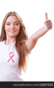 Healthcare, medicine and breast cancer awareness concept. Content young woman with pink cancer ribbon on chest making thumb up hand gesture, isolated on white. woman pink cancer ribbon on chest making thumb up