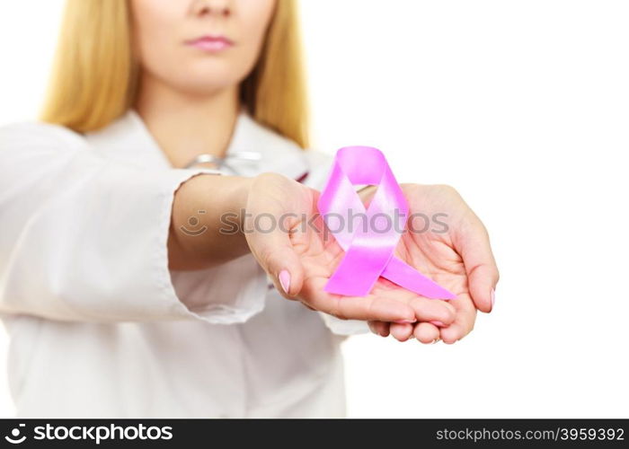 Healthcare, medicine and breast cancer awareness concept. Doctor showing pink ribbon aids symbol