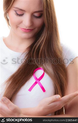 Healthcare, medicine and breast cancer awareness concept - woman in t-shirt with pink cancer ribbon isolated