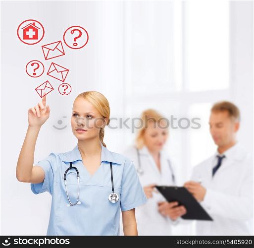 healthcare, medicine and technology concept - focused young doctor or nurse pointing to red envelope