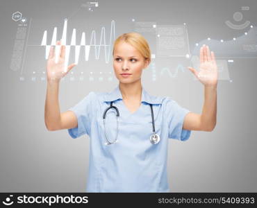 healthcare, medicine and technology concept - serious young doctor or nurse working with cardiogram on virtual screen
