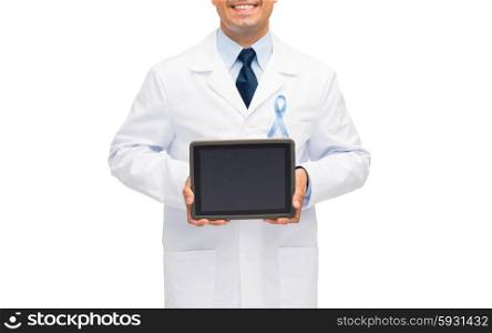healthcare, people and medicine concept - close up of smiling male doctor in white coat with sky blue prostate cancer awareness ribbon holding tablet pc computer
