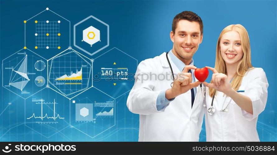 healthcare, people, cardiology and medicine concept - smiling doctors with red heart over blue background and virtual charts. doctors with red heart and charts over blue