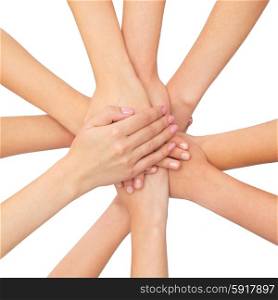 healthcare, people, gesture and medicine concept - close up of women hands on top of each other over white background