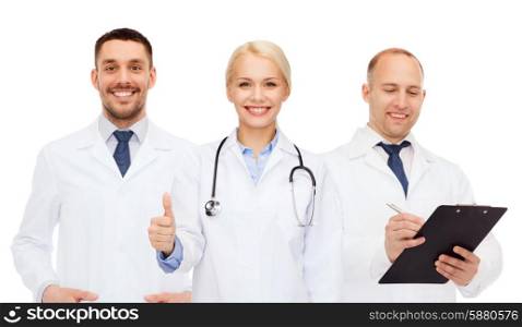 healthcare, people, gesture and medicine concept - group of doctors with stethoscope and clipboard showing thumbs up over white background