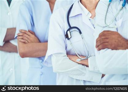 Healthcare people group. Professional doctor working in hospital office or clinic with other doctors, nurse and surgeon. Medical technology research institute and doctor staff service concept.. Healthcare people group working in hospital.