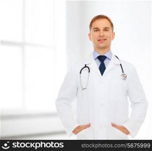 healthcare, profession and medicine concept - smiling male doctor in white coat with stethoscope over white room background