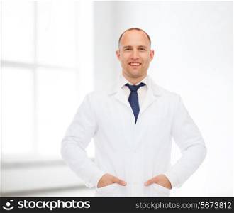 healthcare, profession and medicine concept - smiling male doctor in white coat over white room background