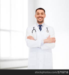 healthcare, profession and medicine concept - smiling male doctor with stethoscope in white coat over white background