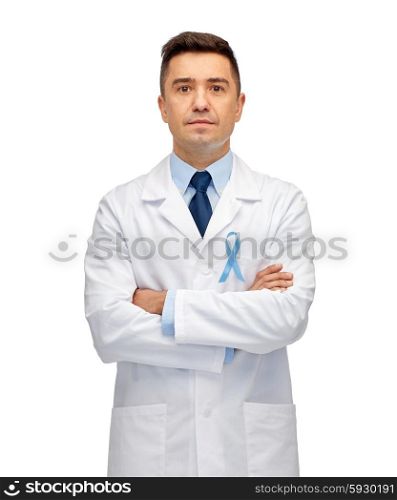 healthcare, profession, people and medicine concept - male doctor in white coat with sky blue prostate cancer awareness ribbon