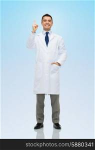 healthcare, profession, people and medicine concept - smiling male doctor in white coat pointing finger up over blue background