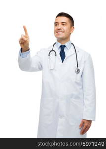 healthcare, profession, people and medicine concept - smiling male doctor in white coat touching or pointing finger to something imaginary