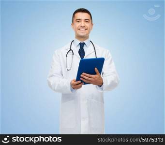 healthcare, profession, people and medicine concept - smiling male doctor in white coat with tablet pc over blue background