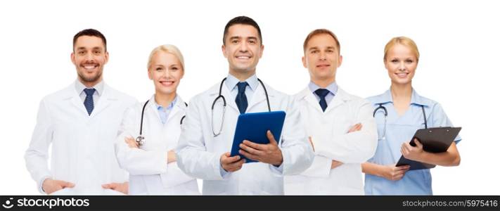 healthcare, profession, people, technology and medicine concept - group of doctors with tablet pc computer and clipboard