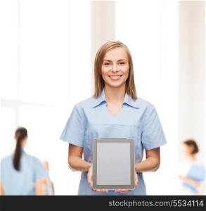 healthcare, technology, advertisement and medicine concept - smiling female doctor or nurse and tablet pc computer with blank screen