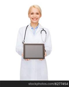 healthcare, technology, advertisement and medicine concept - smiling female doctor with stethoscope and blank black tablet pc screen