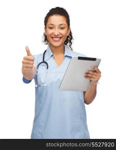 healthcare, technology and medicine concept - female african american doctor or nurse with stethoscope and tablet pc showing thumbs up