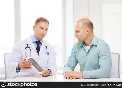 healthcare, technology and medicine concept - serious doctor with tablet pc computer and patient in hospital