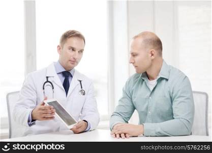 healthcare, technology and medicine concept - serious doctor with tablet pc computer and patient in hospital