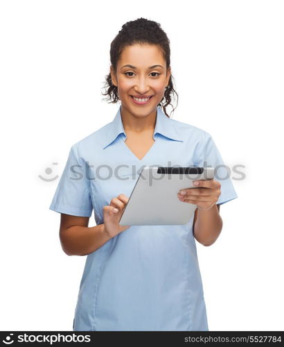 healthcare, technology and medicine concept - smiling female african american doctor or nurse with tablet pc computer