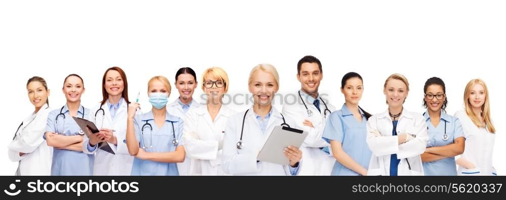 healthcare, technology and medicine concept - smiling female and male doctors and nurses with tablet pc computer