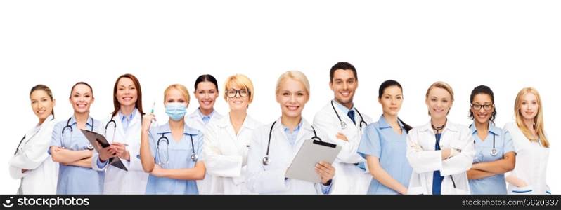 healthcare, technology and medicine concept - smiling female and male doctors and nurses with tablet pc computer
