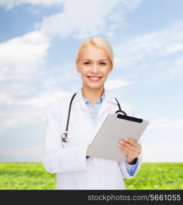 healthcare, technology and medicine concept - smiling female doctor with stethoscope and tablet pc computer