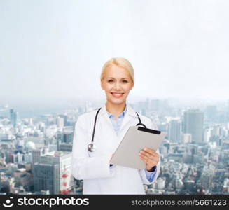 healthcare, technology and medicine concept - smiling female doctor with stethoscope and tablet pc computer