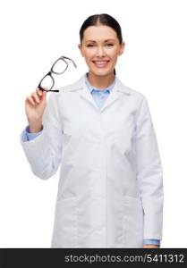 healthcare, vision and medicine concept - smiling female doctor without stethoscope