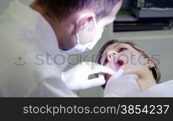 Healthcare worker and client in medical clinic, dentist during visit to inspect mouth and dental hygiene of young female patient. Sequence of medium shot and closeup of tools