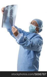 Healthcare worker holding up x-ray