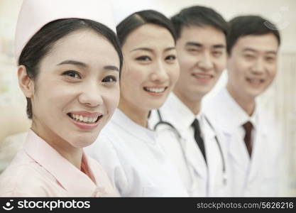 Healthcare workers standing in a row, China