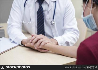Healthy and medical concept. Doctor holding patient hand to give. Healthy and medical concept. Doctor holding patient hand to give encourage in hospital.