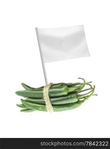 Healthy and organic food concept. Fresh green hot chili pepper with flag showing the benefits or the price of fruits.. Healthy and organic food concept