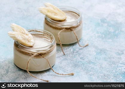 Healthy Banana Mousse or Pudding on Dark Background.. Healthy Banana Mousse or Pudding on Dark Background