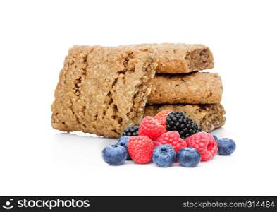 Healthy bio breakfast biscuits with blueberries and raspberries and blackberries on white background