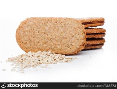 Healthy bio breakfast grain biscuits with oats on white background