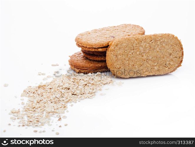 Healthy bio breakfast grain biscuits with oats on white background