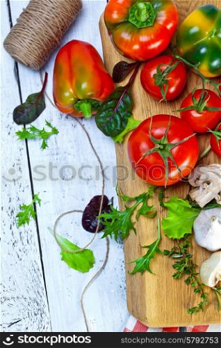 Healthy Bio Vegetables on a Wooden Background