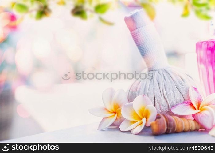 Healthy body care and wellness setting and frangipany flowers at sunny nature background with green leaves