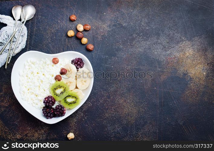 healthy breakfast, oat flakes with fresh berry and fruit
