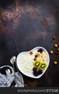 healthy breakfast, oat flakes with fresh berry and fruit