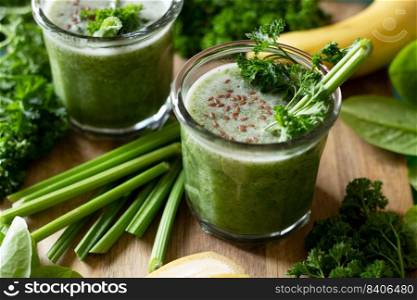 healthy breakfast - parsley, celery, apple and banana smoothie. raw food and vegetarianism 
