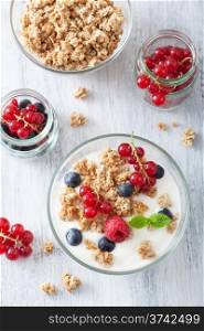 healthy breakfast with yogurt granola and berry