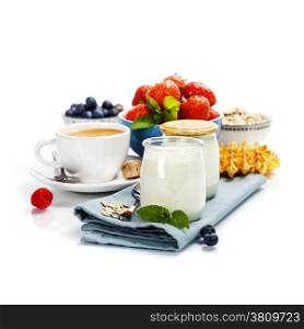 Healthy breakfast - yogurt with muesli and berries - health and diet concept