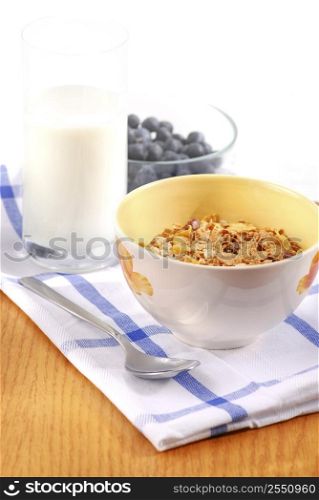 Healthy breaksfast of cereal, milk and blueberries