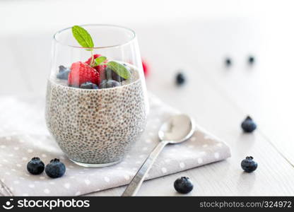 Healthy chia pudding with almond milk in a glass