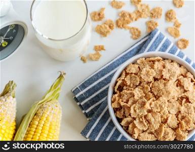 Healthy Corn Flakes with milk for Breakfast on table, food and drink