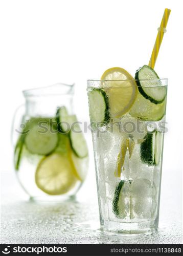 Healthy detox fizzy water with lemon and cucumber in Highball glass. Fresh Summer Drink. Healthy food concept. Detox diet.